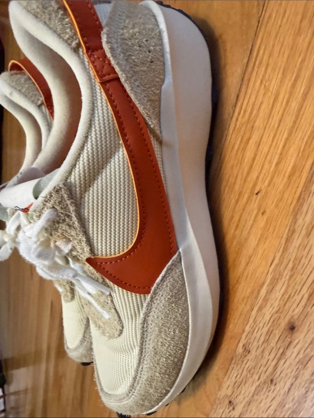 Nike Woman’s Sneakers - Cream Upper with Rust Orange Swoosh